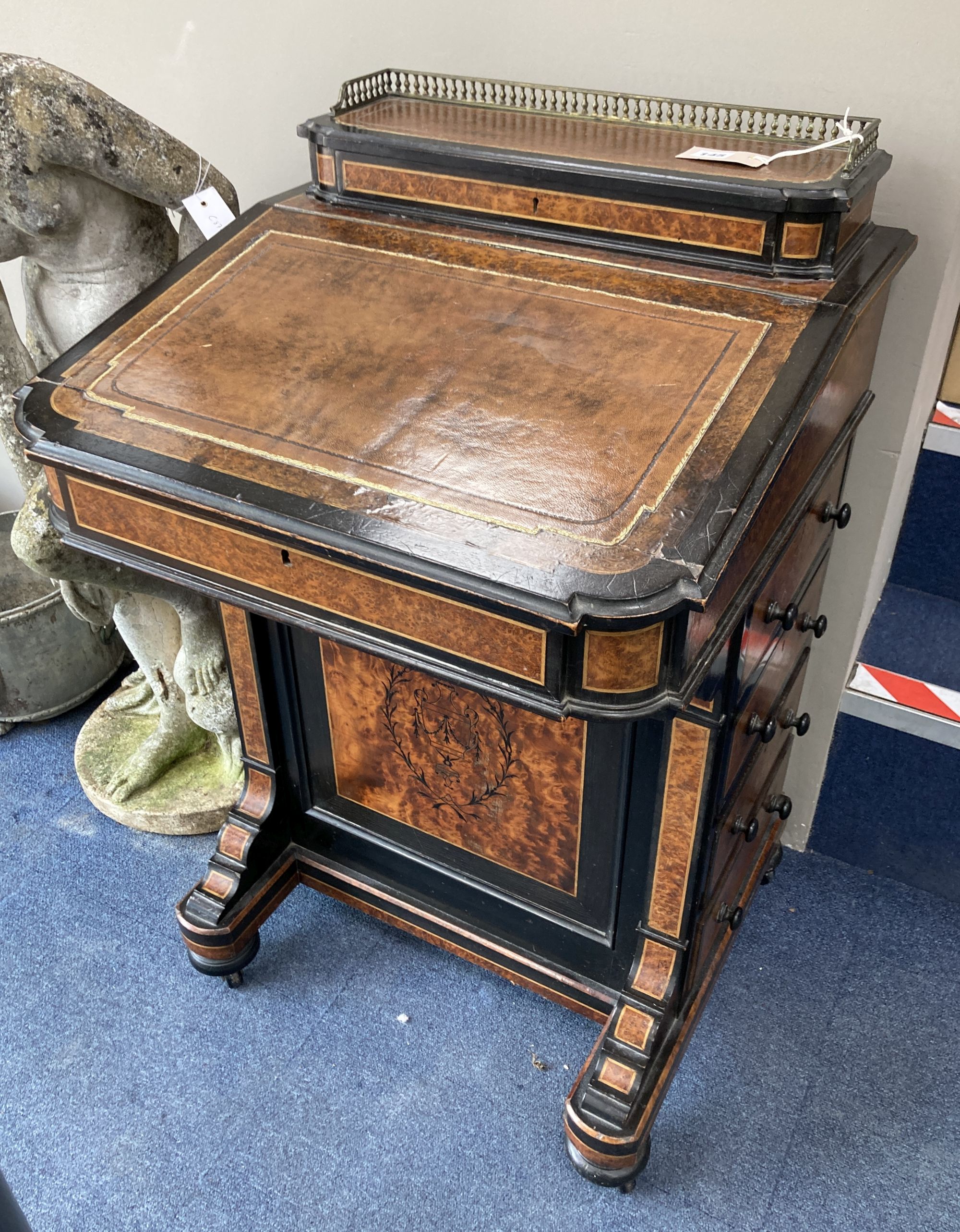A Victorian ebonised and amboyna Davenport, width 56cm, depth 57cm, height 90cm